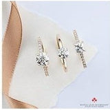 Brilliant cut diamond set shoulders engagement ring