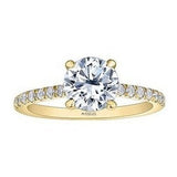 Brilliant cut diamond set shoulders engagement ring