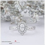 Frosted Pear Halo Solitaire .73ct