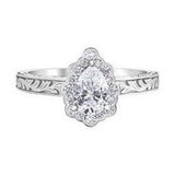 Frosted Pear Halo Solitaire .73ct