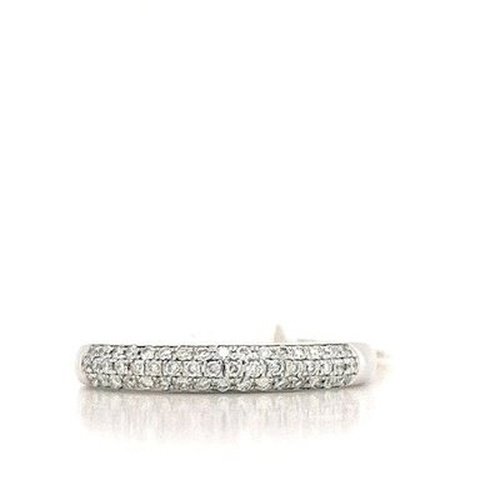 Three rows of claw set diamonds on curved band