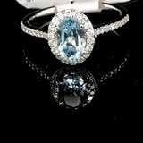 18ct White Gold Oval Blue Topaz & Diamond ring