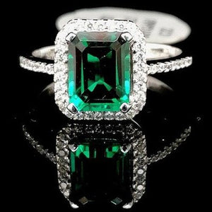 Green & White CZ Halo style ring 9ct
