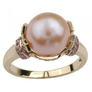 Pearl dress ring set with diamonds